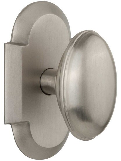 Arched Rosette Door Set with Homestead Knobs in Satin Nickel.